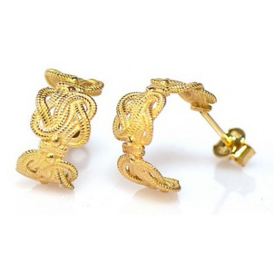 Mattenklopper oorbellen kopen | Mattenklopper oorbellen goud | Mattenklopper oorbellen betekenis