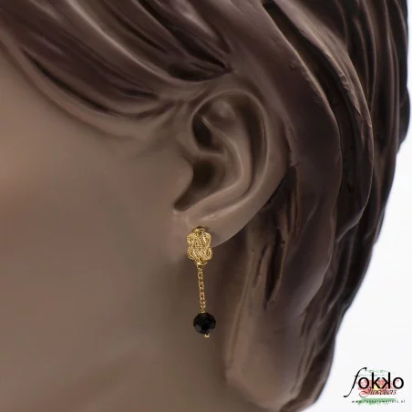 Vergulde mattenklopper oorbellen | Surinaamse sieraden